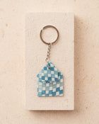 Keychain with a blue checkered design 