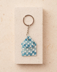 Keychain with a blue checkered design 