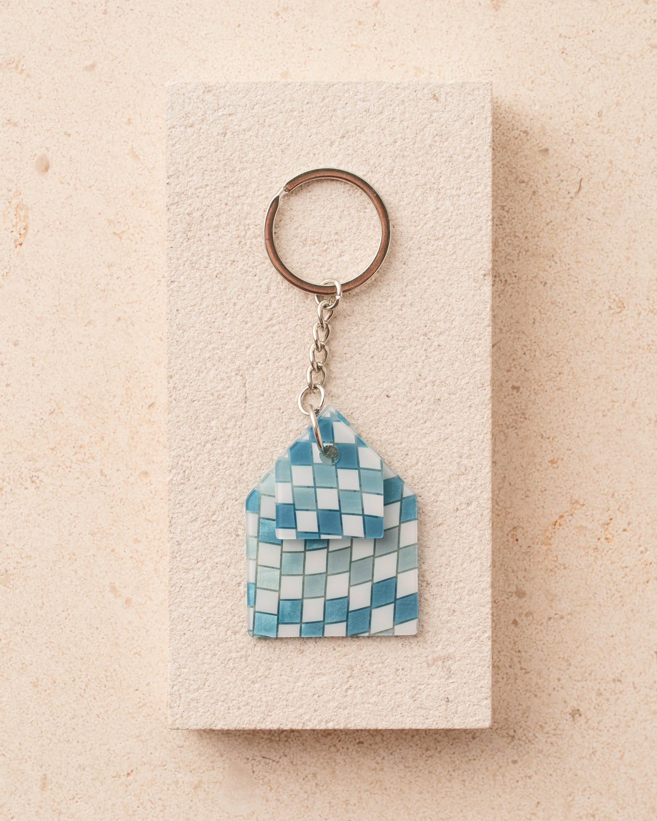 Keychain with a blue checkered design 