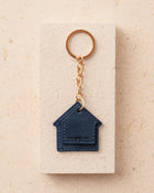 Blue house-shaped keychain 