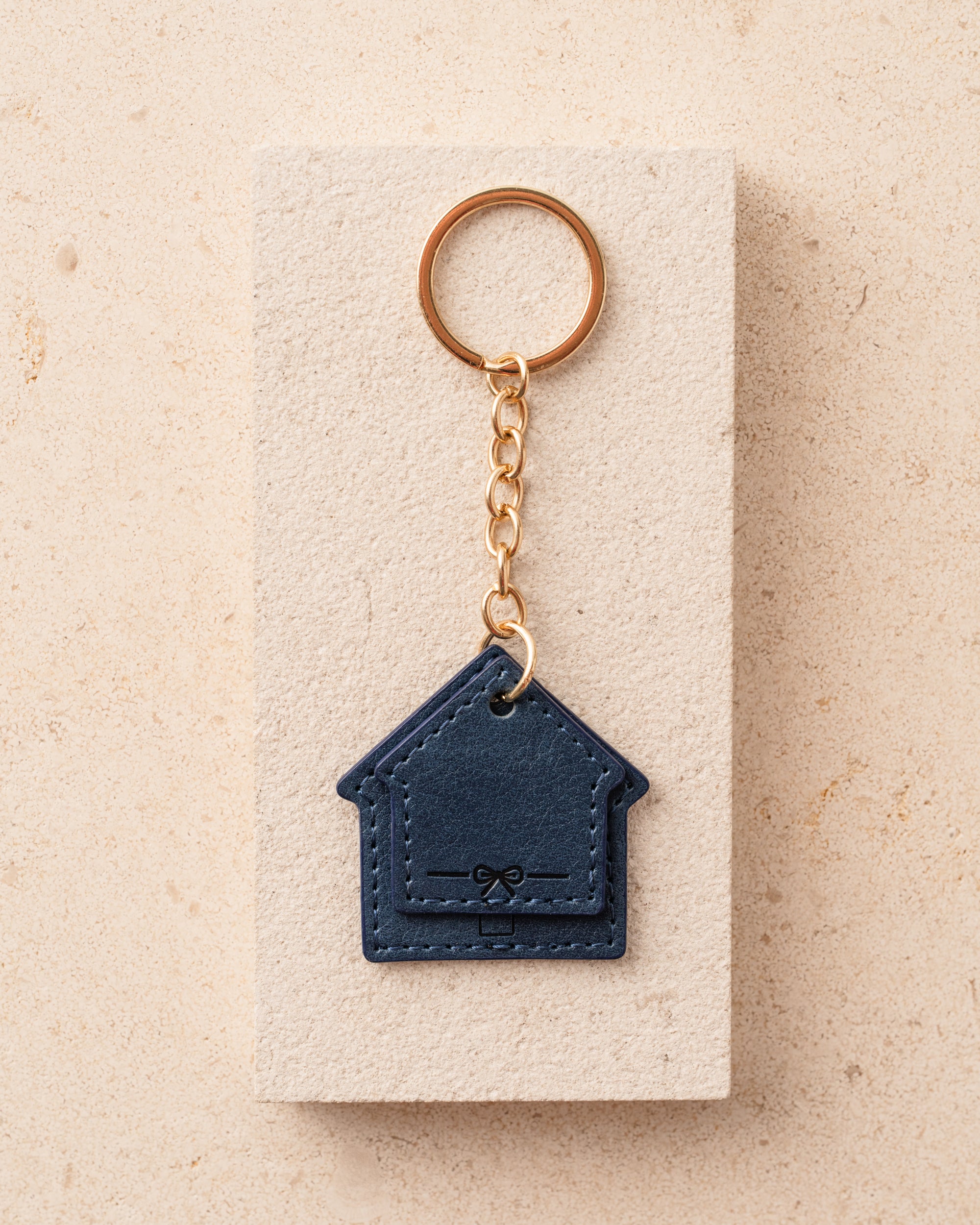 Blue house-shaped keychain 