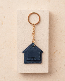 Blue house-shaped keychain 