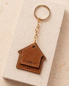 Brown leather house-shaped keychain
