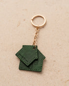 Green house-shaped keychain 