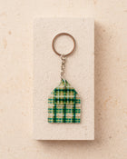Keychain with green plaid design