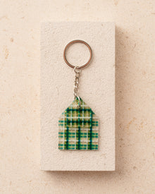 Keychain with green plaid design